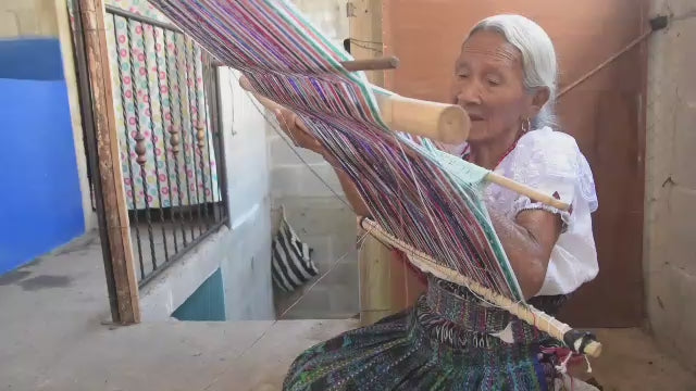 Load video: Handmade pillows crafted from traditional textiles